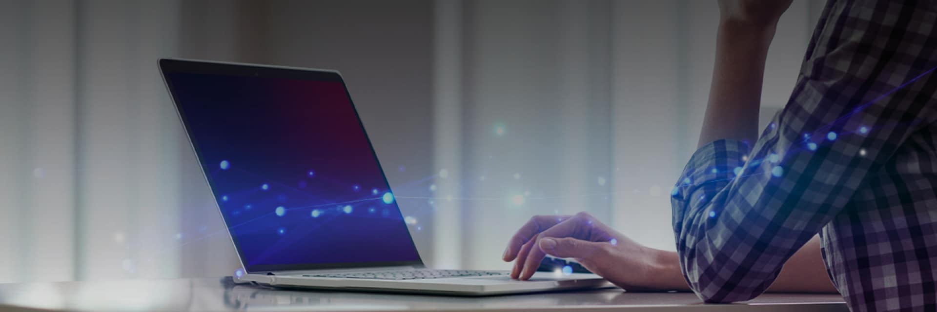 Illustrated photo of a person using a laptop