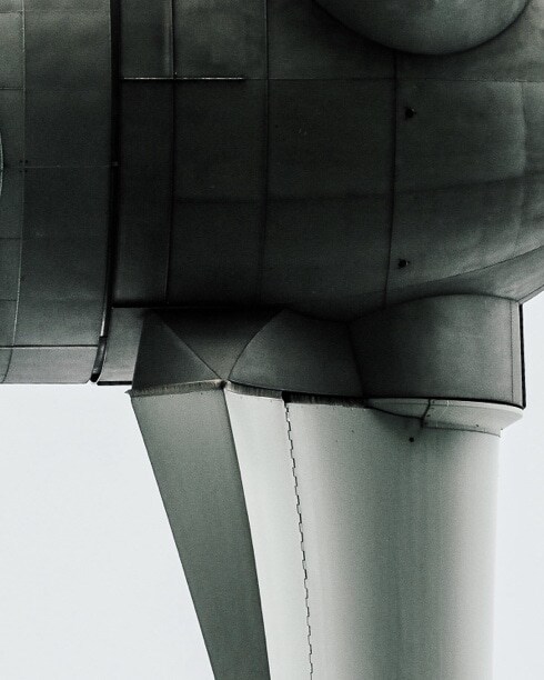 Close-up of the base of a wind turbine.